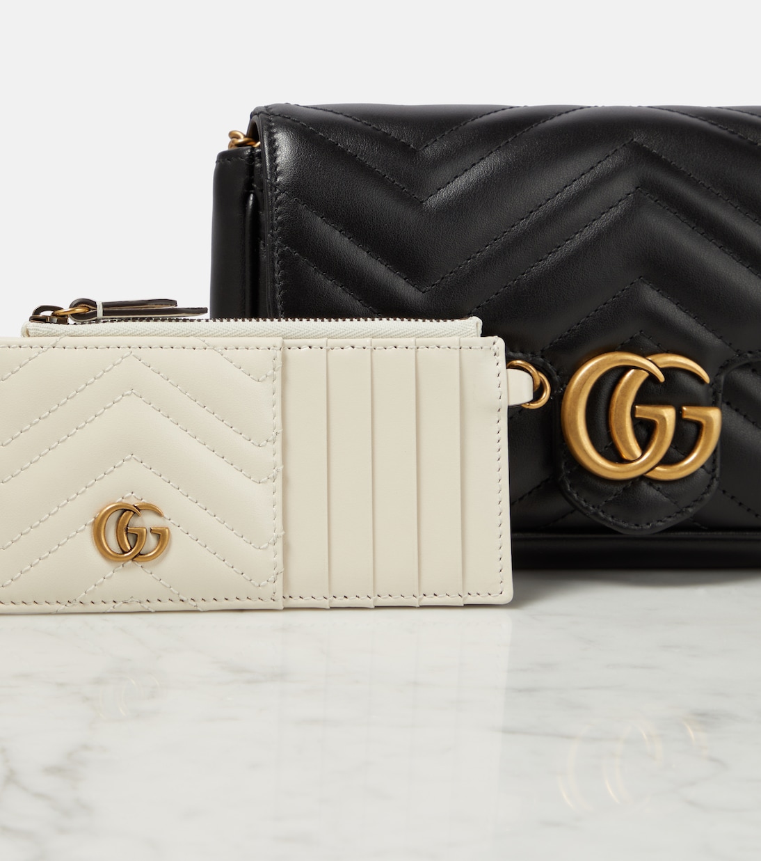 GG Marmont leather wallet on chain in black Gucci Mytheresa
