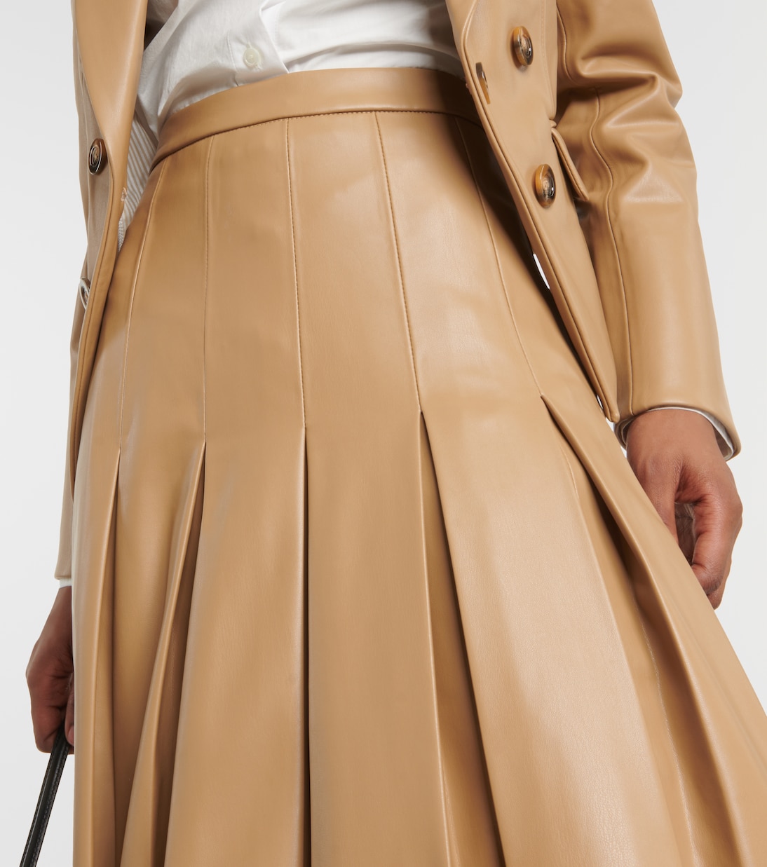 Herson pleated faux leather midi skirt in beige - Veronica