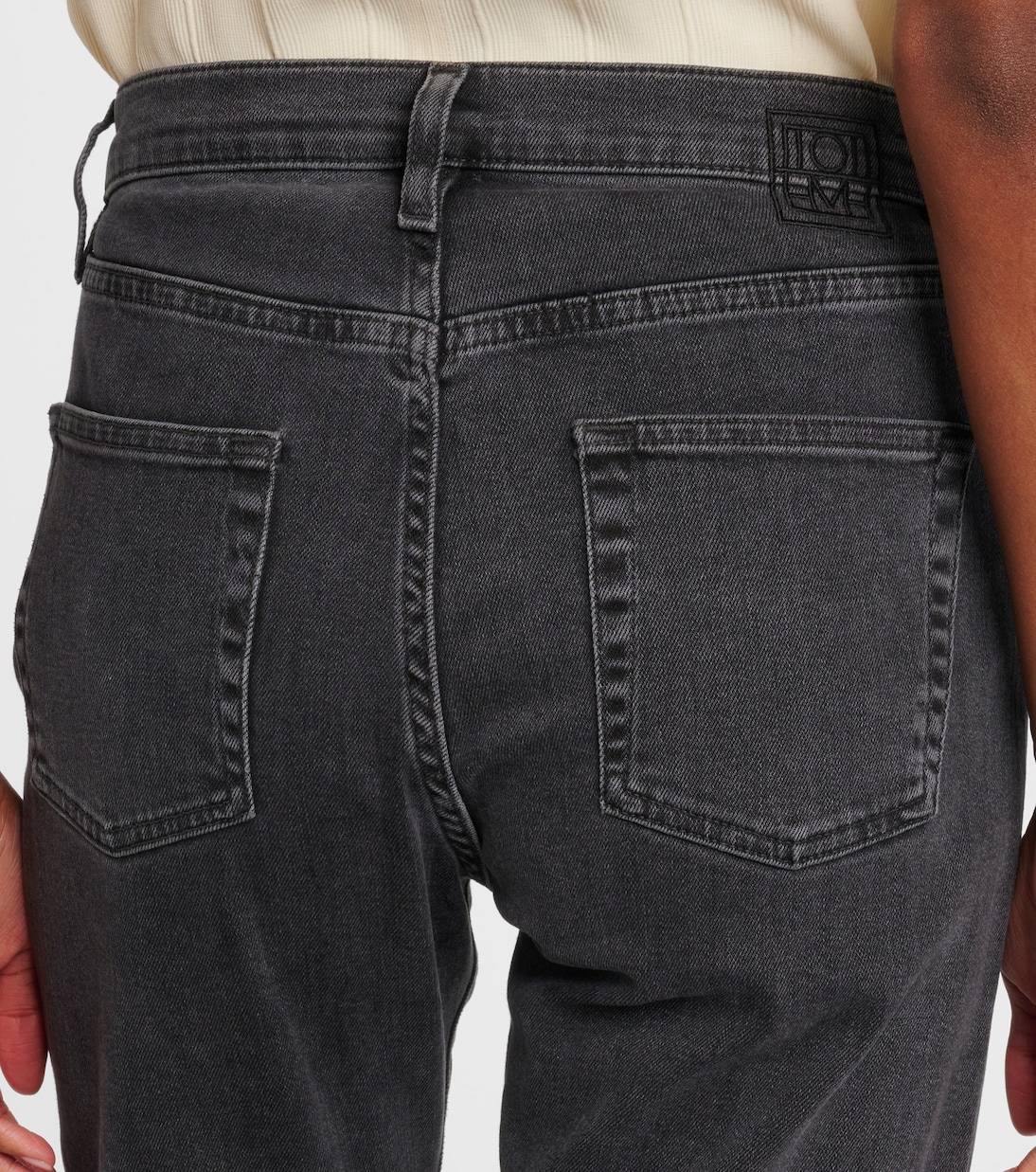 Mid-rise twisted-seam straight jeans | Toteme