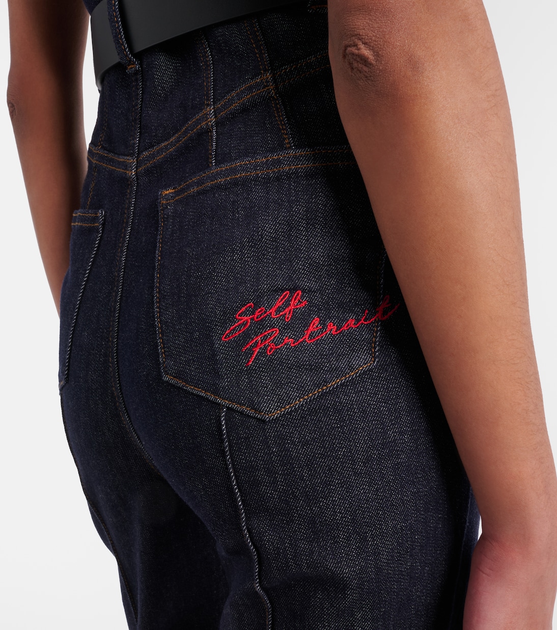 Belted denim jumpsuit | Self-Portrait