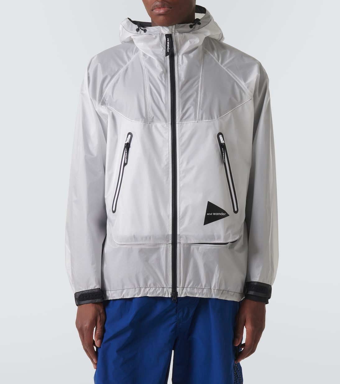 Impermeable de PU con paneles | And Wander