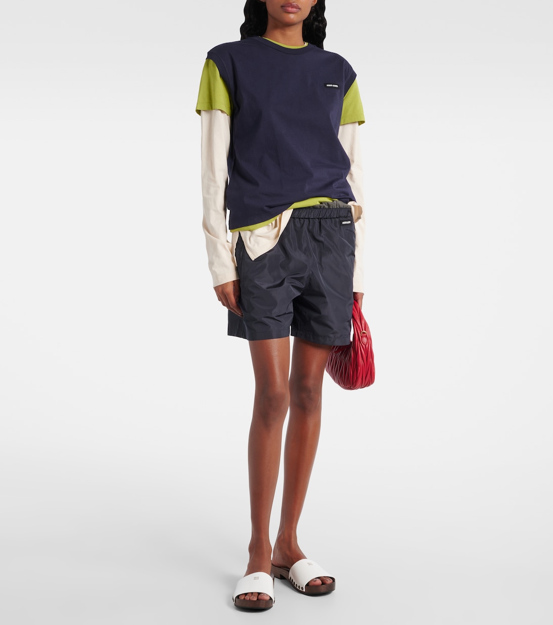 Pantoletten aus Lackleder | Miu Miu