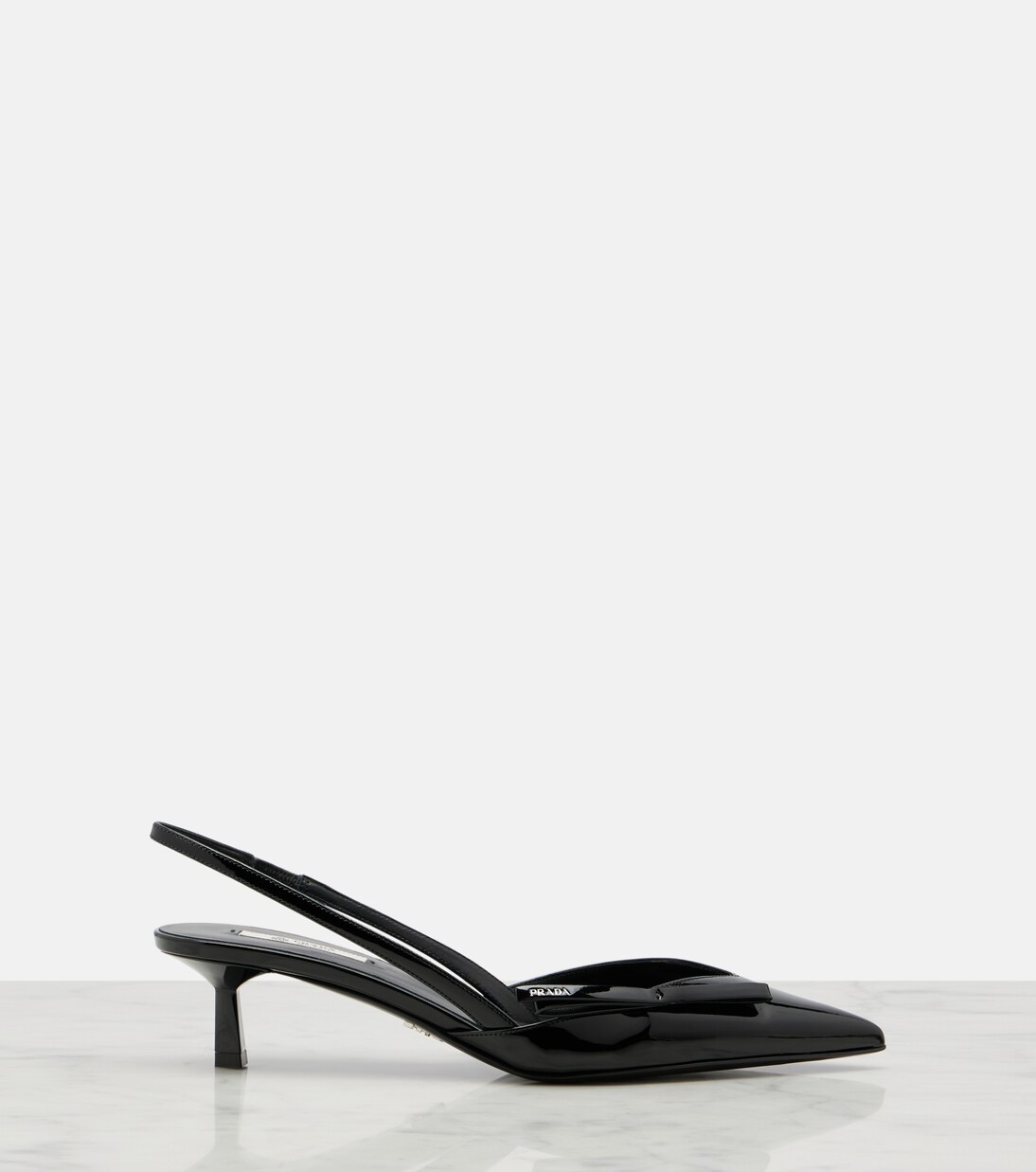 Patent leather slingback pumps | Prada