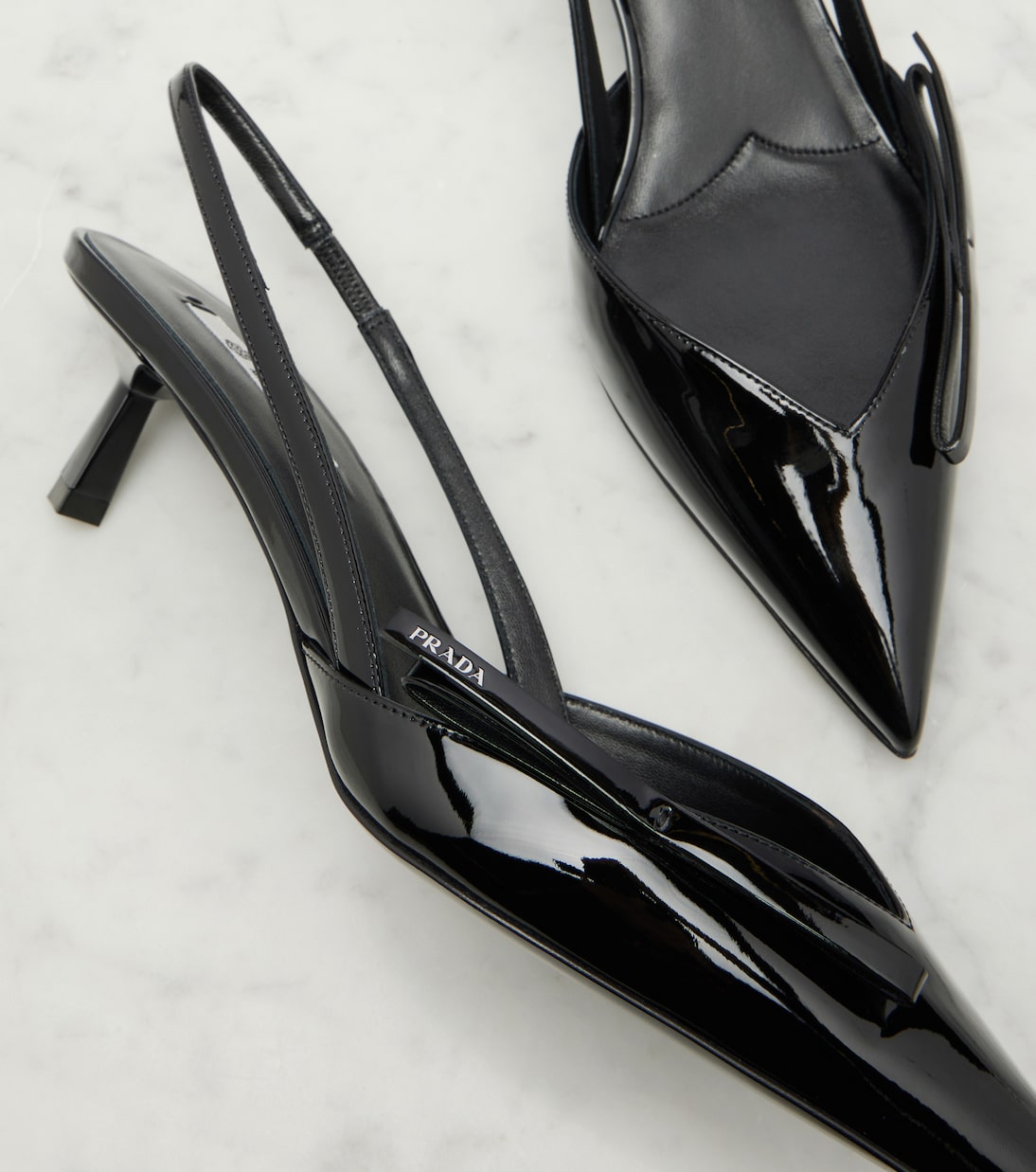 Patent leather slingback pumps | Prada