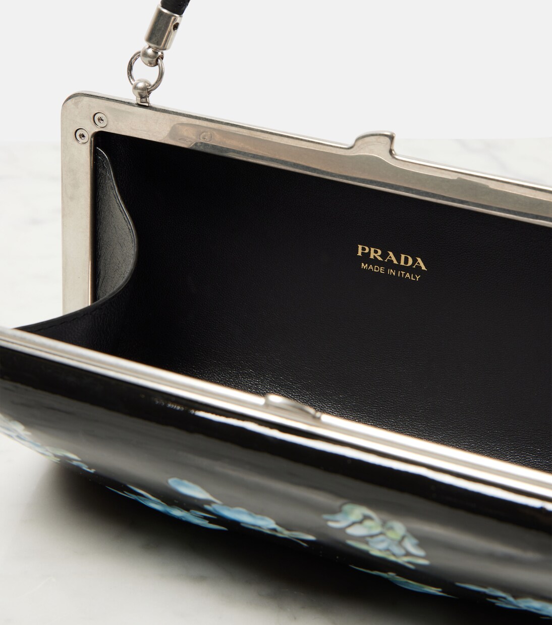 Pochette en cuir verni à fleurs | Prada