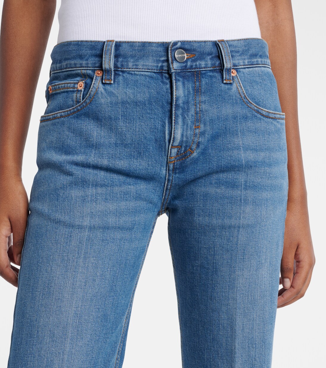 Jeans flared con efecto desgastado | Gucci