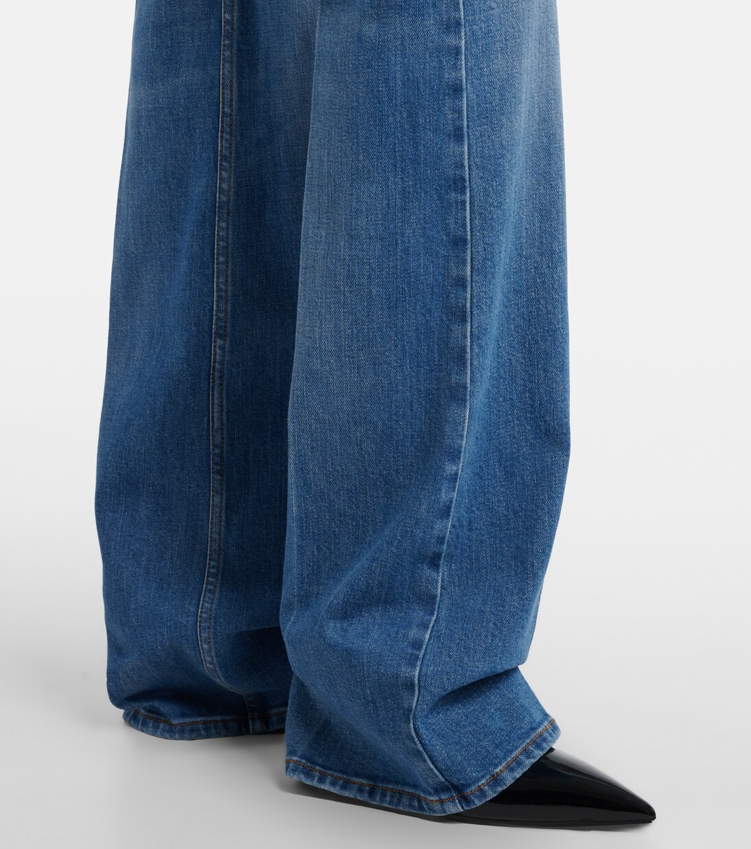 Jeans flared con efecto desgastado | Gucci