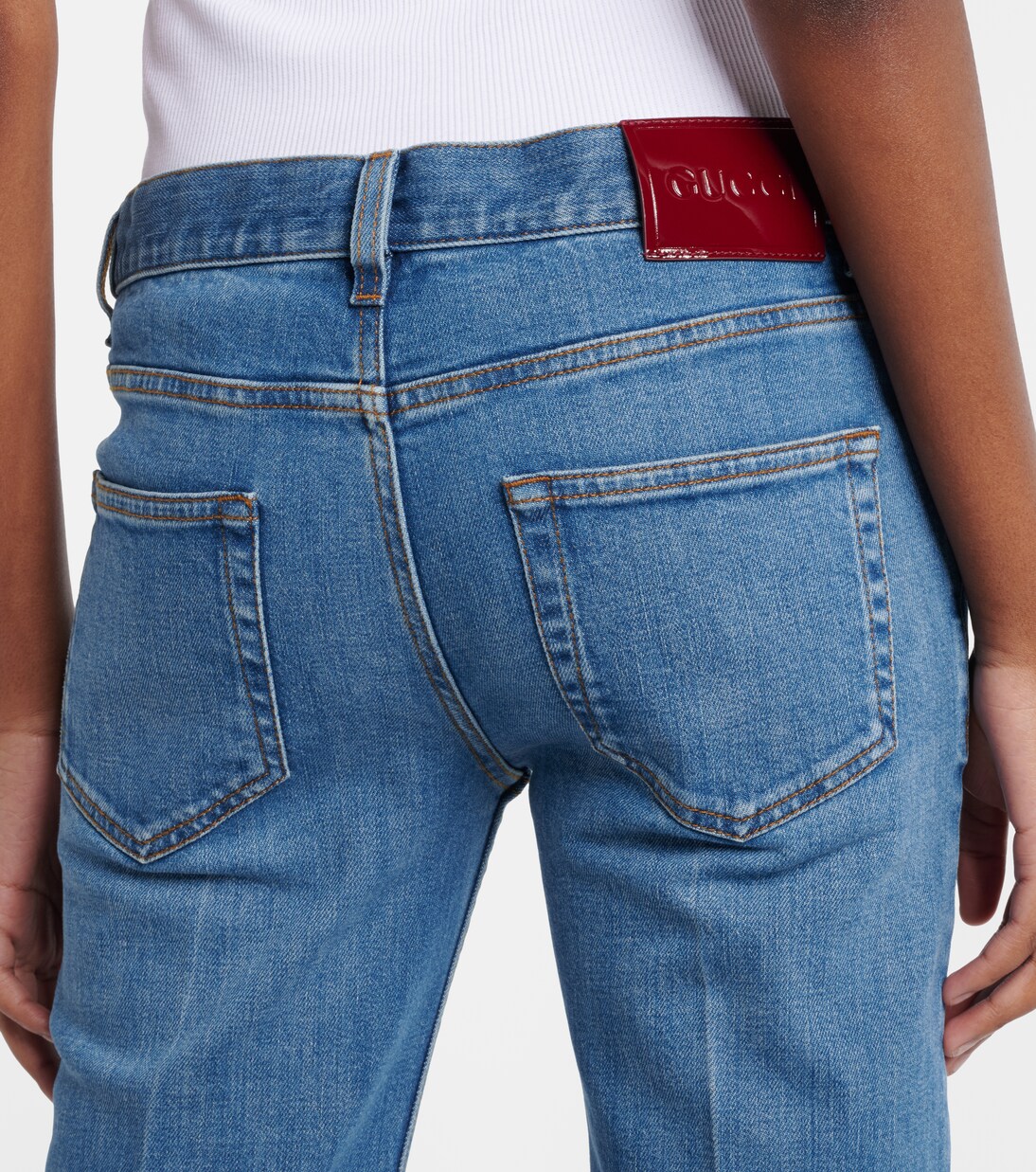 Jeans flared con efecto desgastado | Gucci