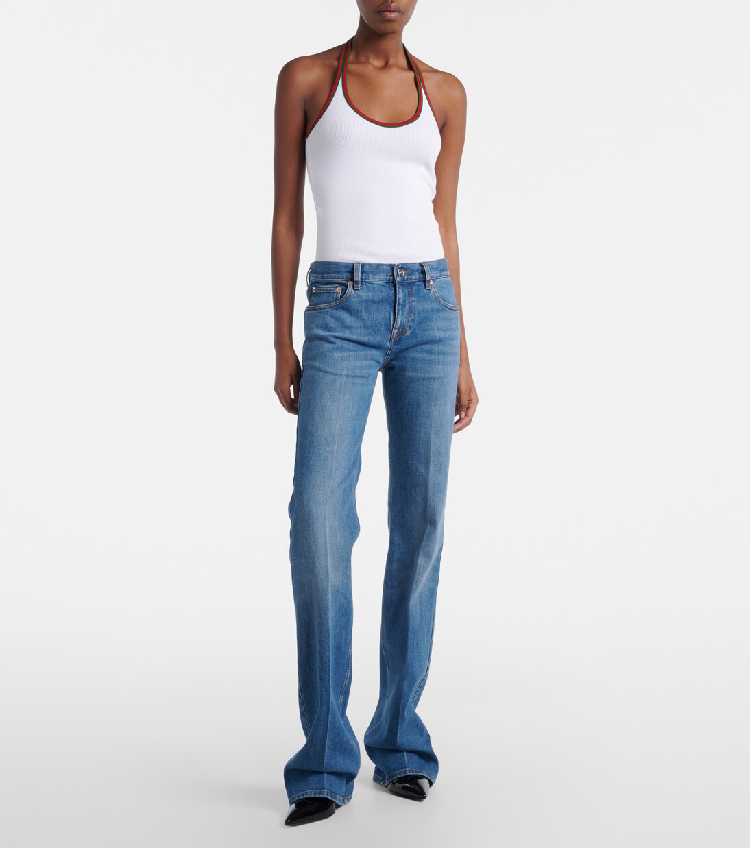 Jeans flared con efecto desgastado | Gucci