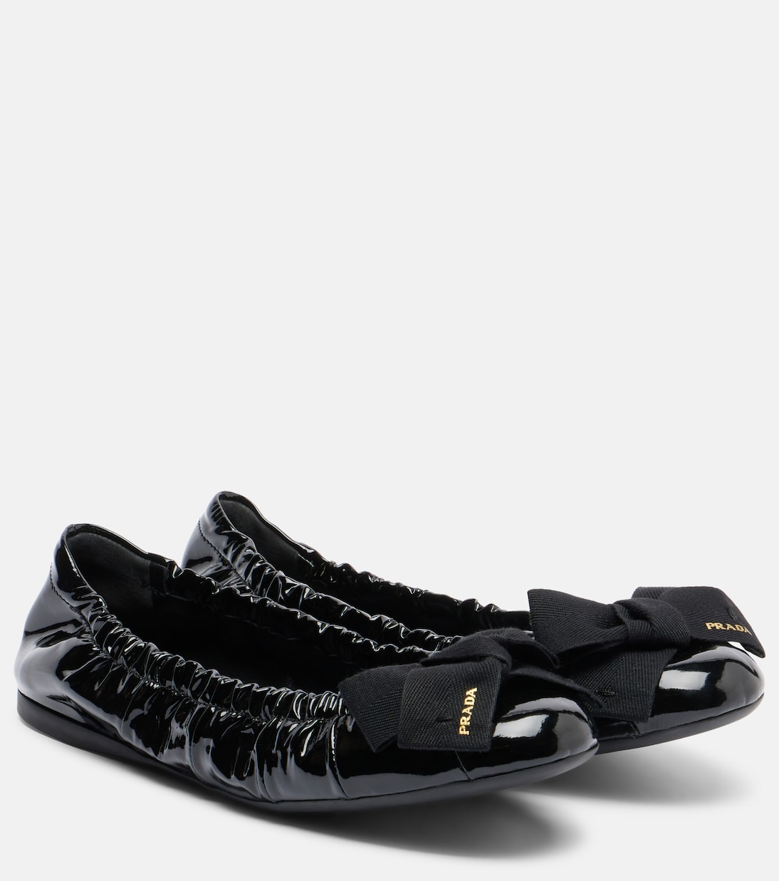 Bow-detail patent leather ballet flats | Prada