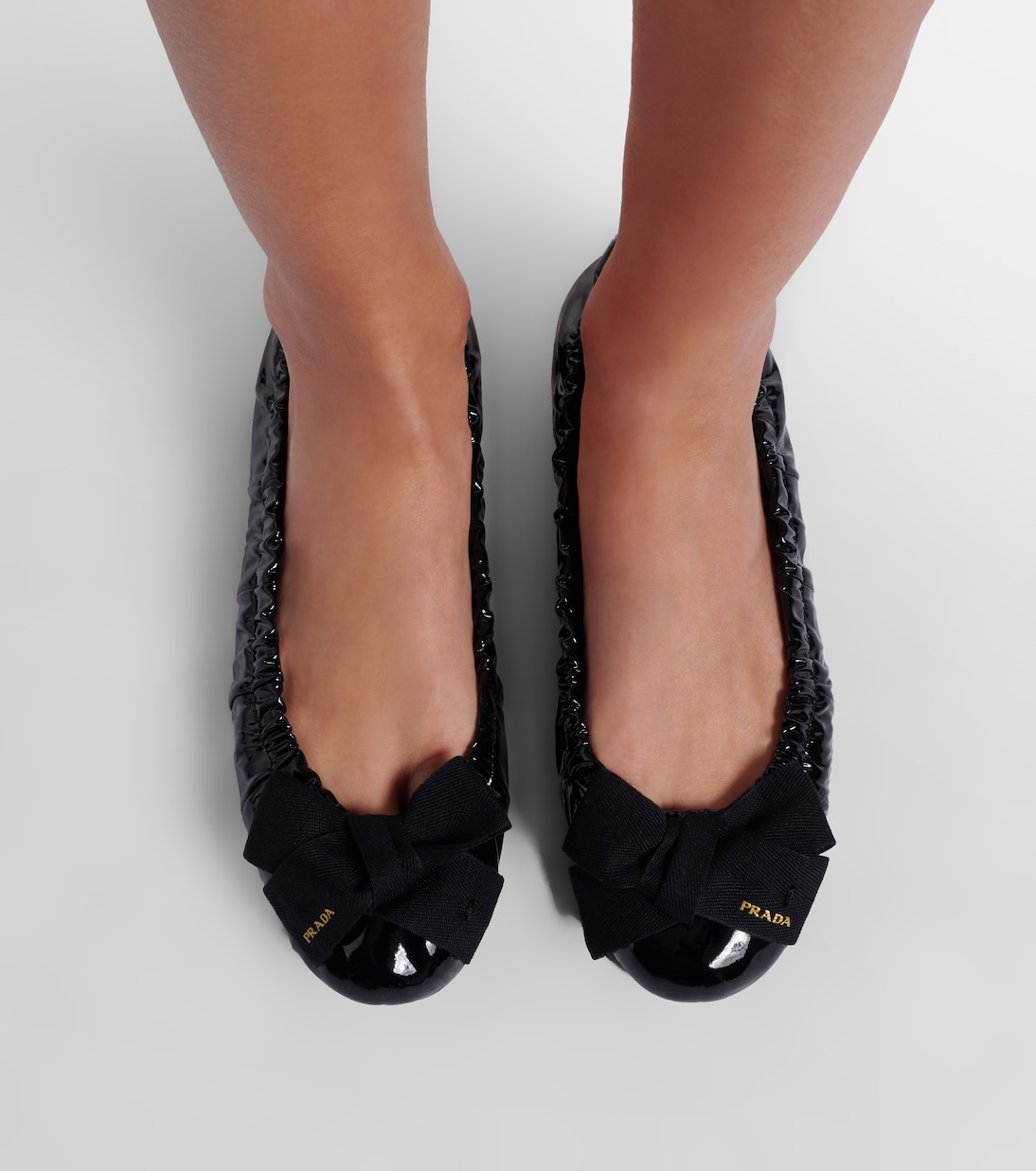 Bow-detail patent leather ballet flats | Prada