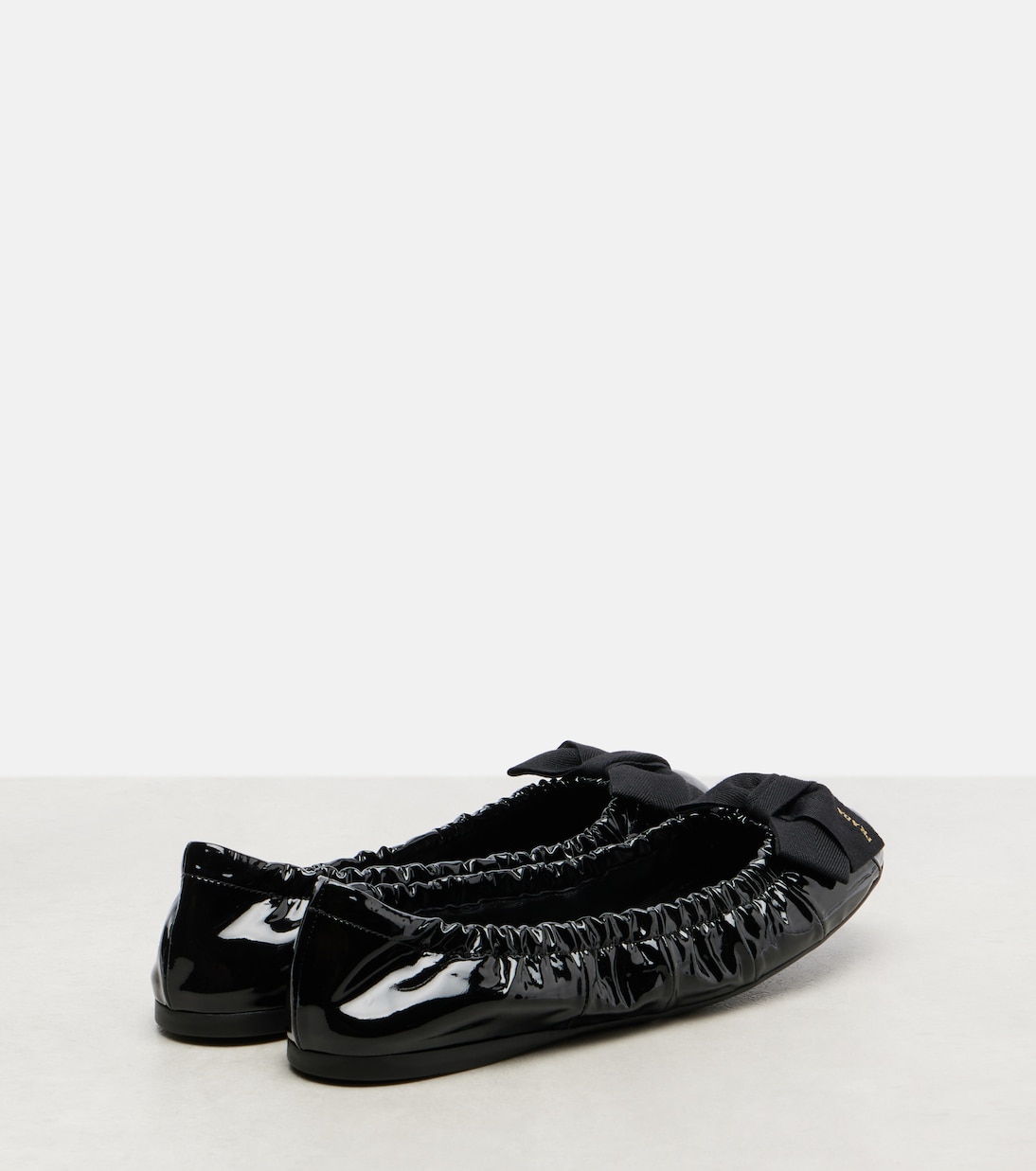 Bow-detail patent leather ballet flats | Prada