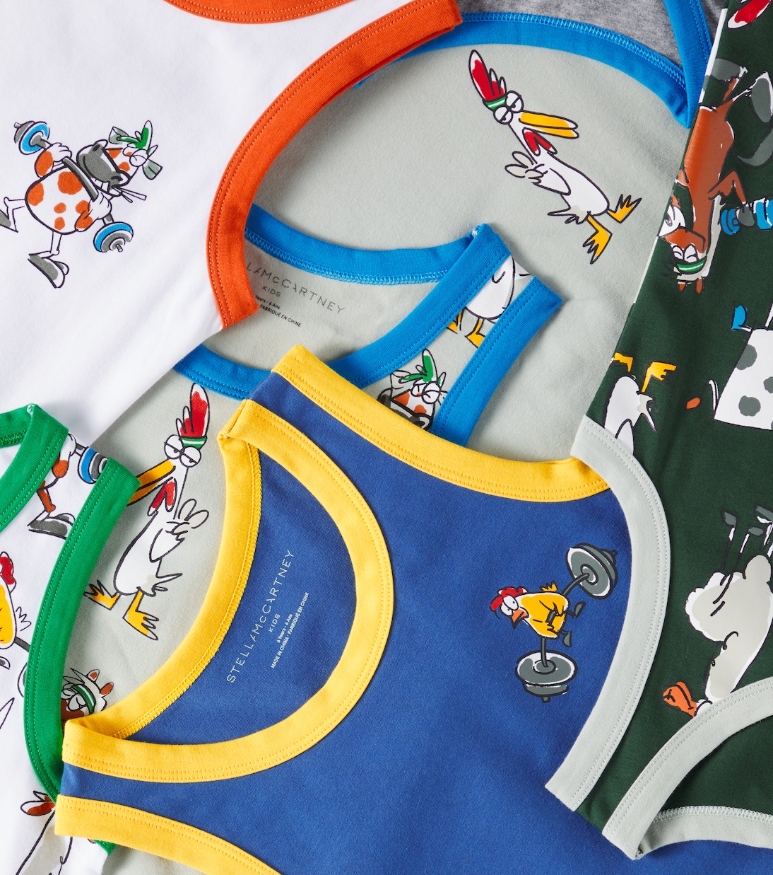 Set of 7 cotton-blend jersey tank tops | Stella McCartney Kids