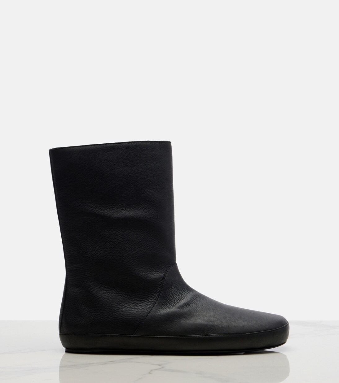 Toni shearling-lined leather ankle boots | The Row