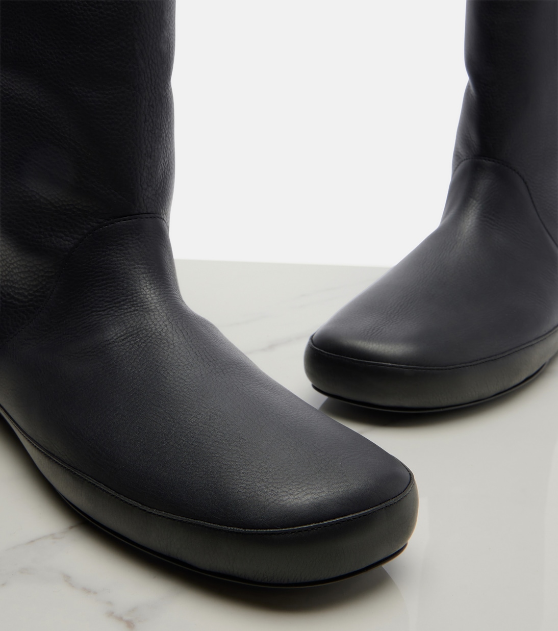 Toni shearling-lined leather ankle boots | The Row