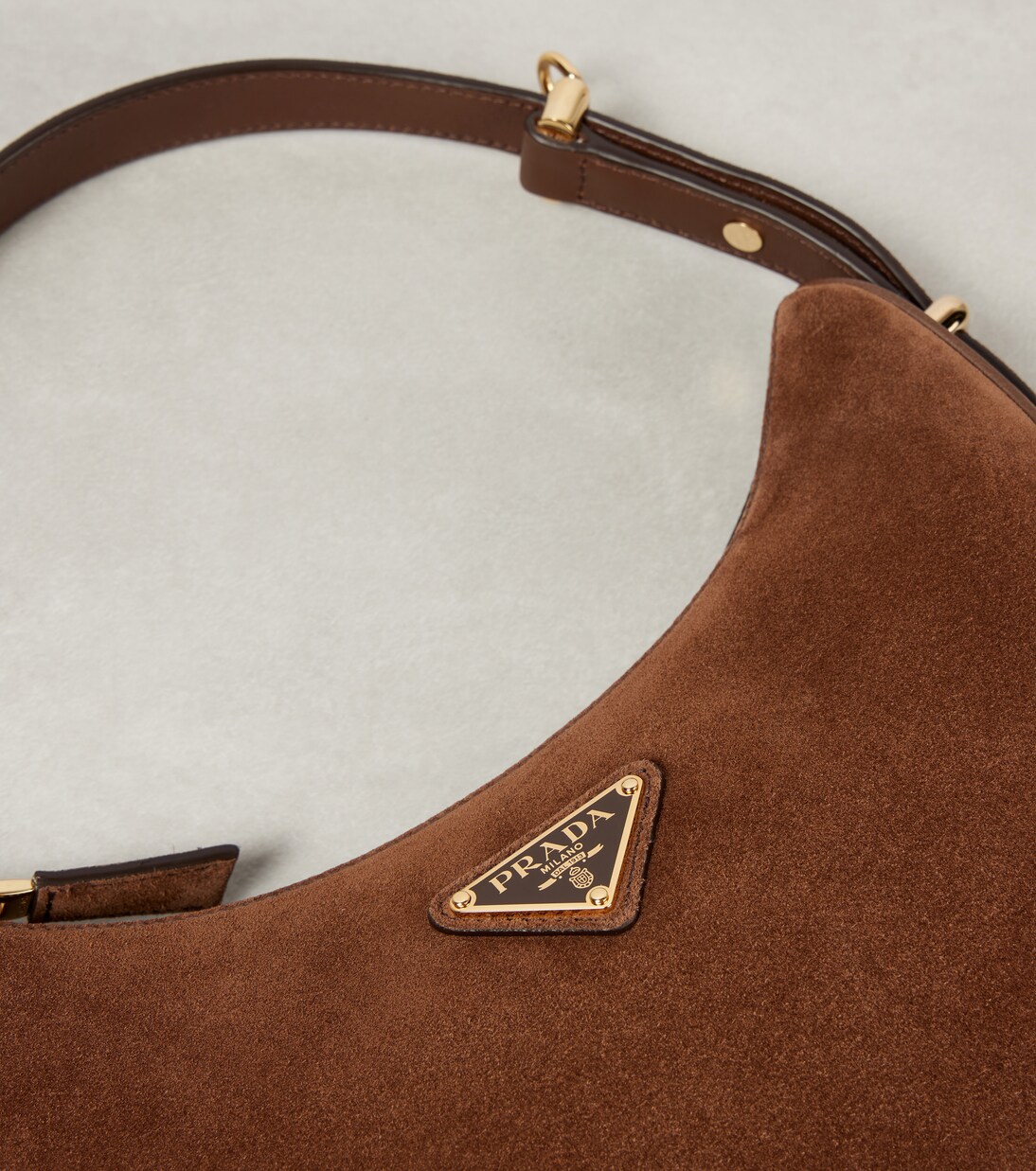 Borsa a spalla Arqué Small in suede | Prada