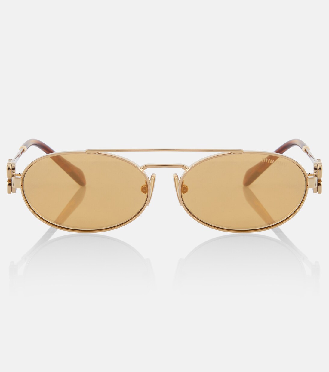 Occhiali da sole ovali con logo MIU MIU per uno stile giovane e trendy