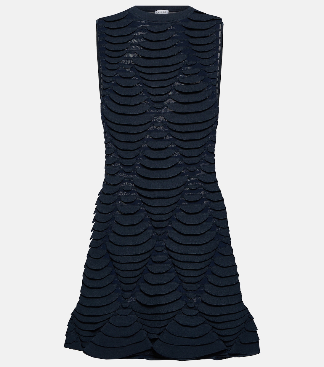 Vestido corto de punto con efecto serpiente de Alaïa, estilo juvenil y moderno.
