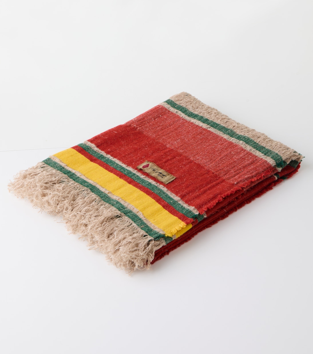Xoroi striped wool-blend throw | The House of Lyria