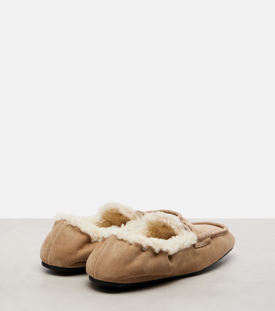 Shearling-lined suede penny loafers | Miu Miu