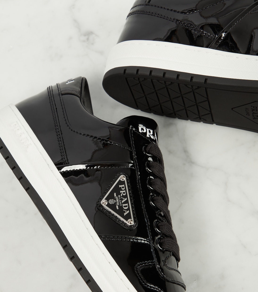 Womens black patent prada trainers hotsell