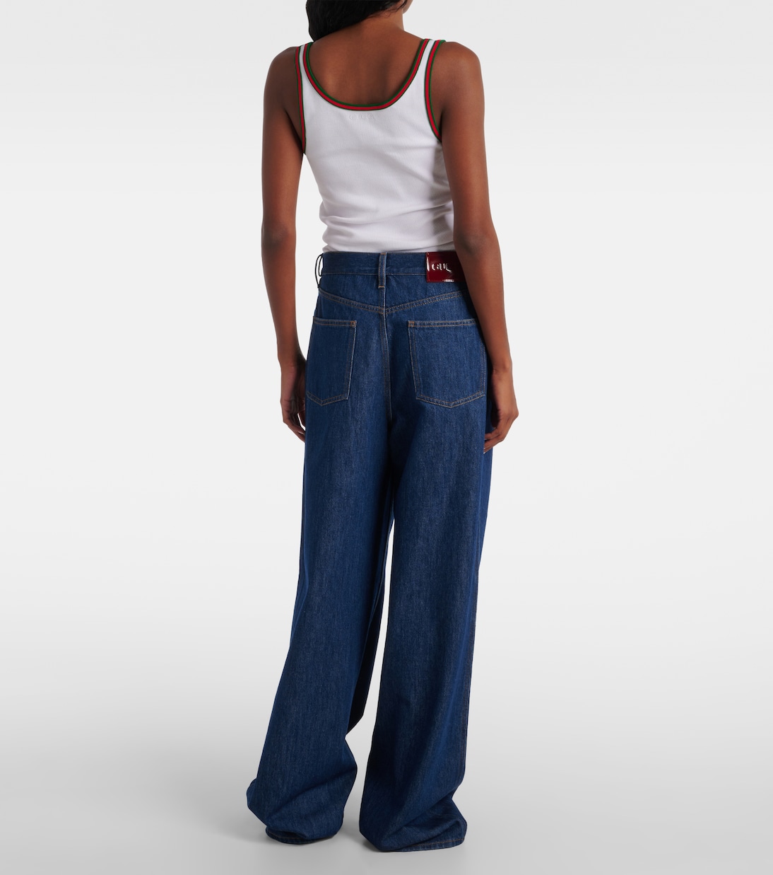Jean ample bordé de cuir | Gucci