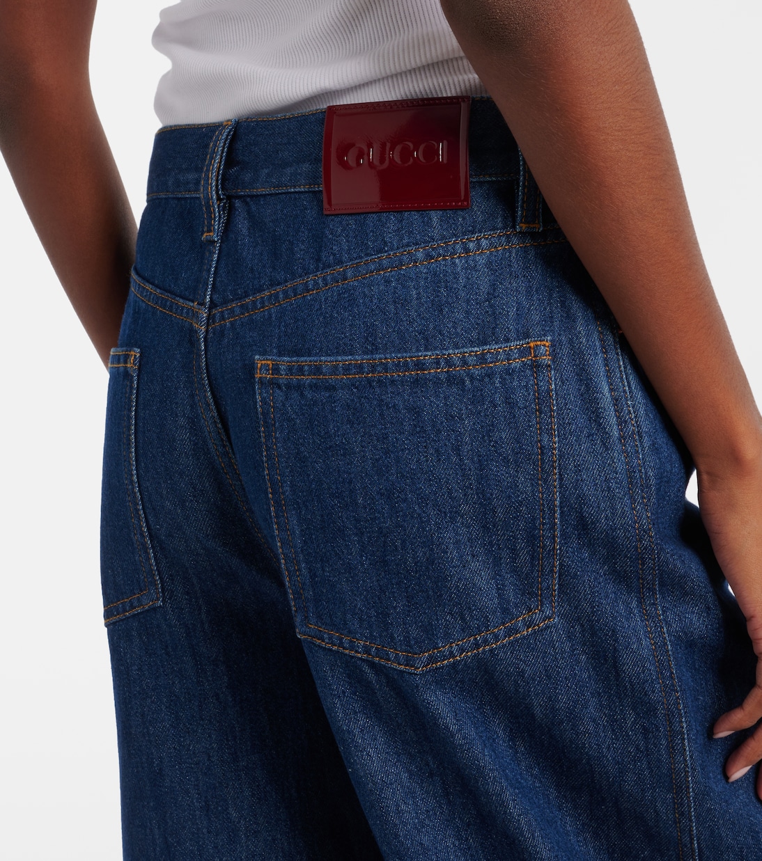 Jean ample bordé de cuir | Gucci