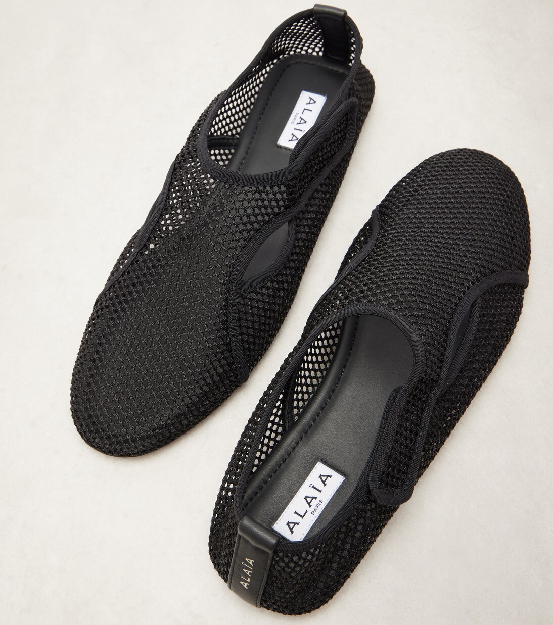 Fishnet slip-on shoes | Alaïa