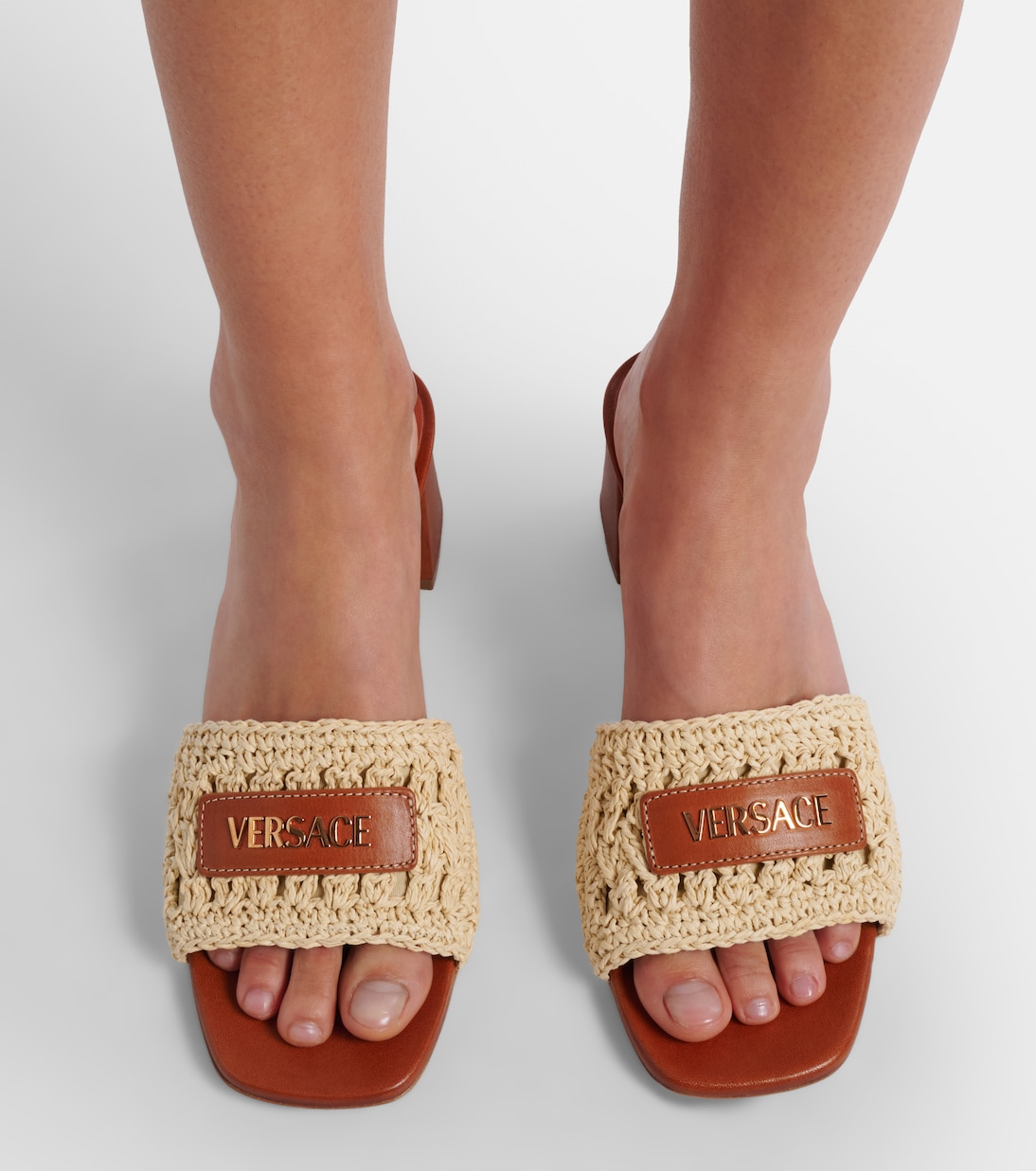 Logo raffia and leather mules | Versace