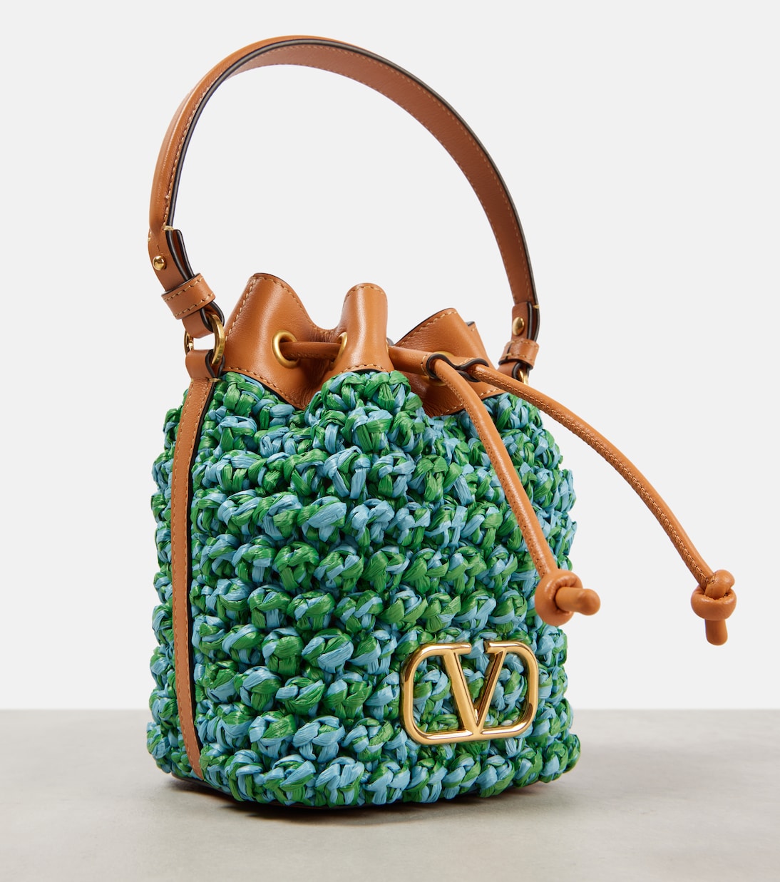 VLogo Mini raffia-effect bucket bag | Valentino Garavani