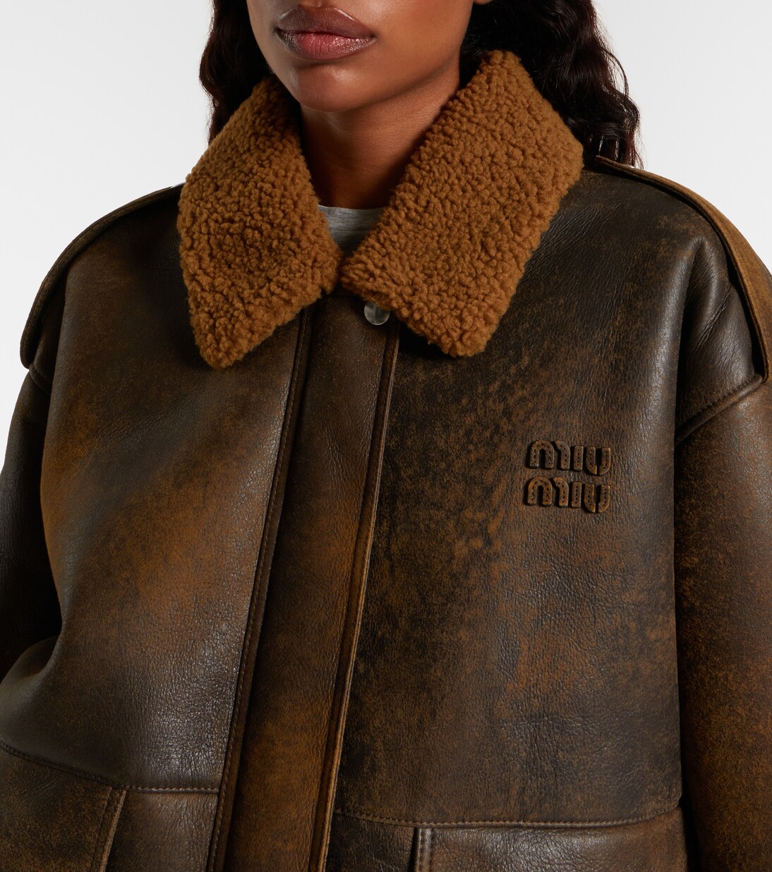 Shearling-trimmed leather blouson jacket | Miu Miu