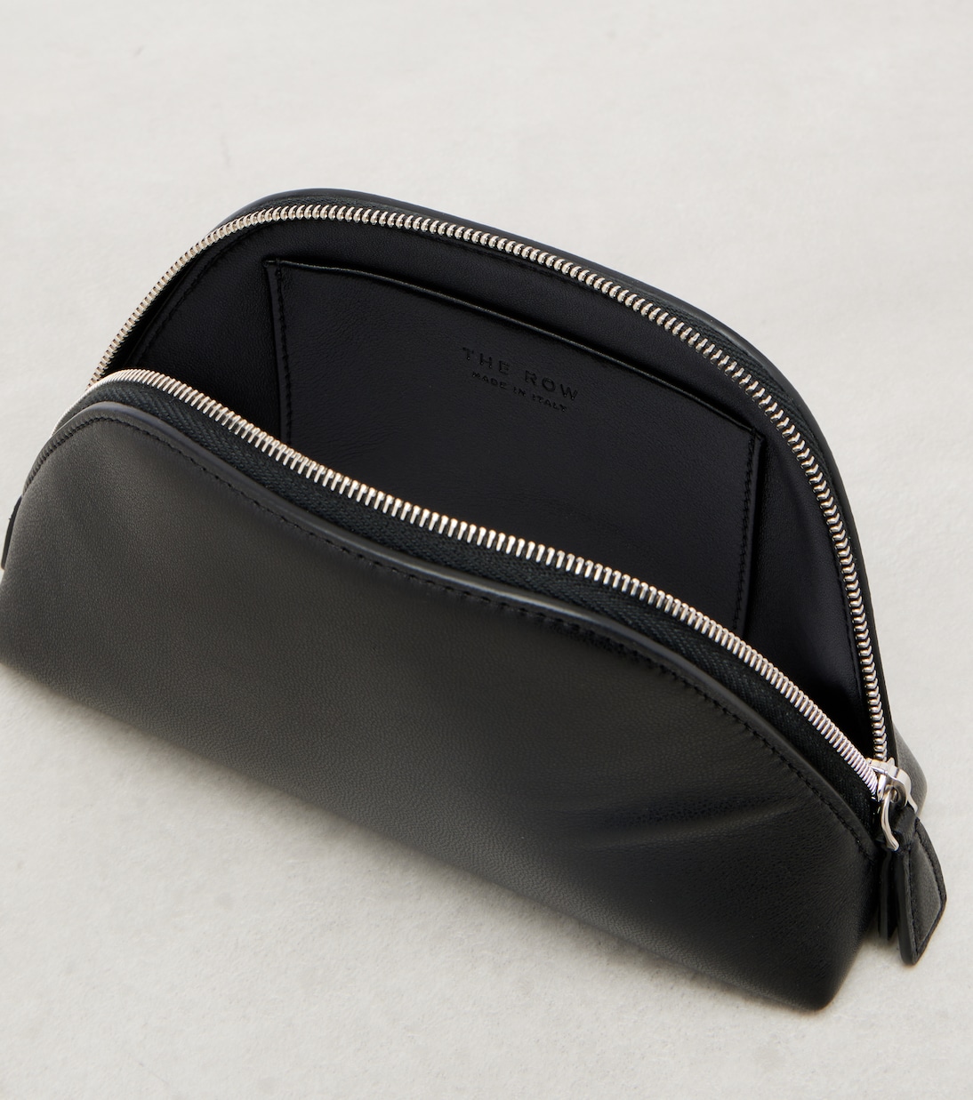 Devon Mini leather clutch | The Row