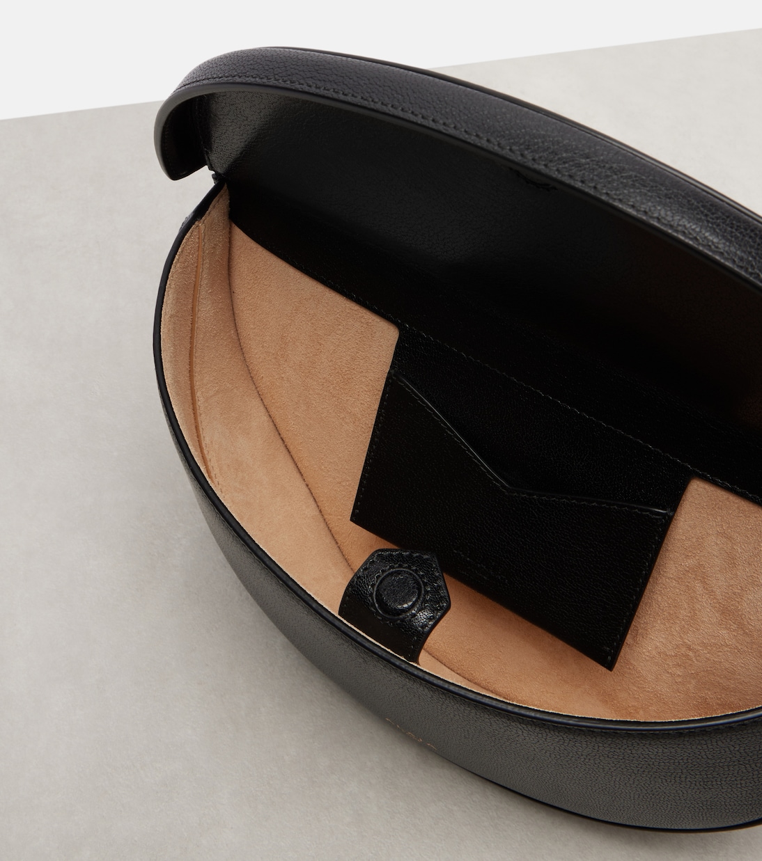 Hip Small leather shoulder bag | Alaïa
