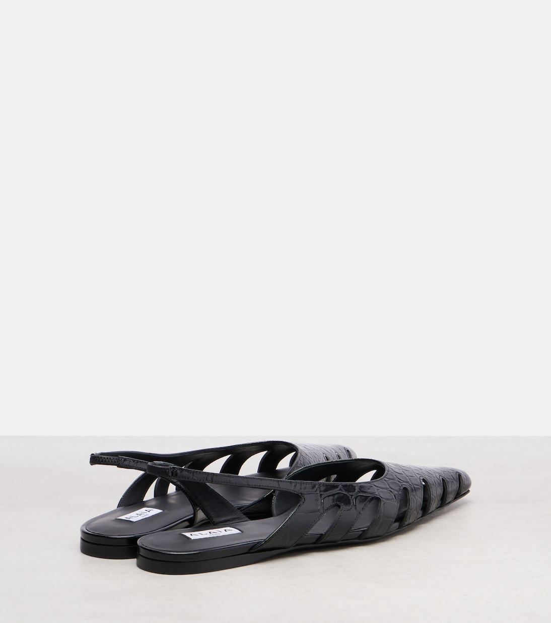 Croc-effect leather slingback flats | Alaïa