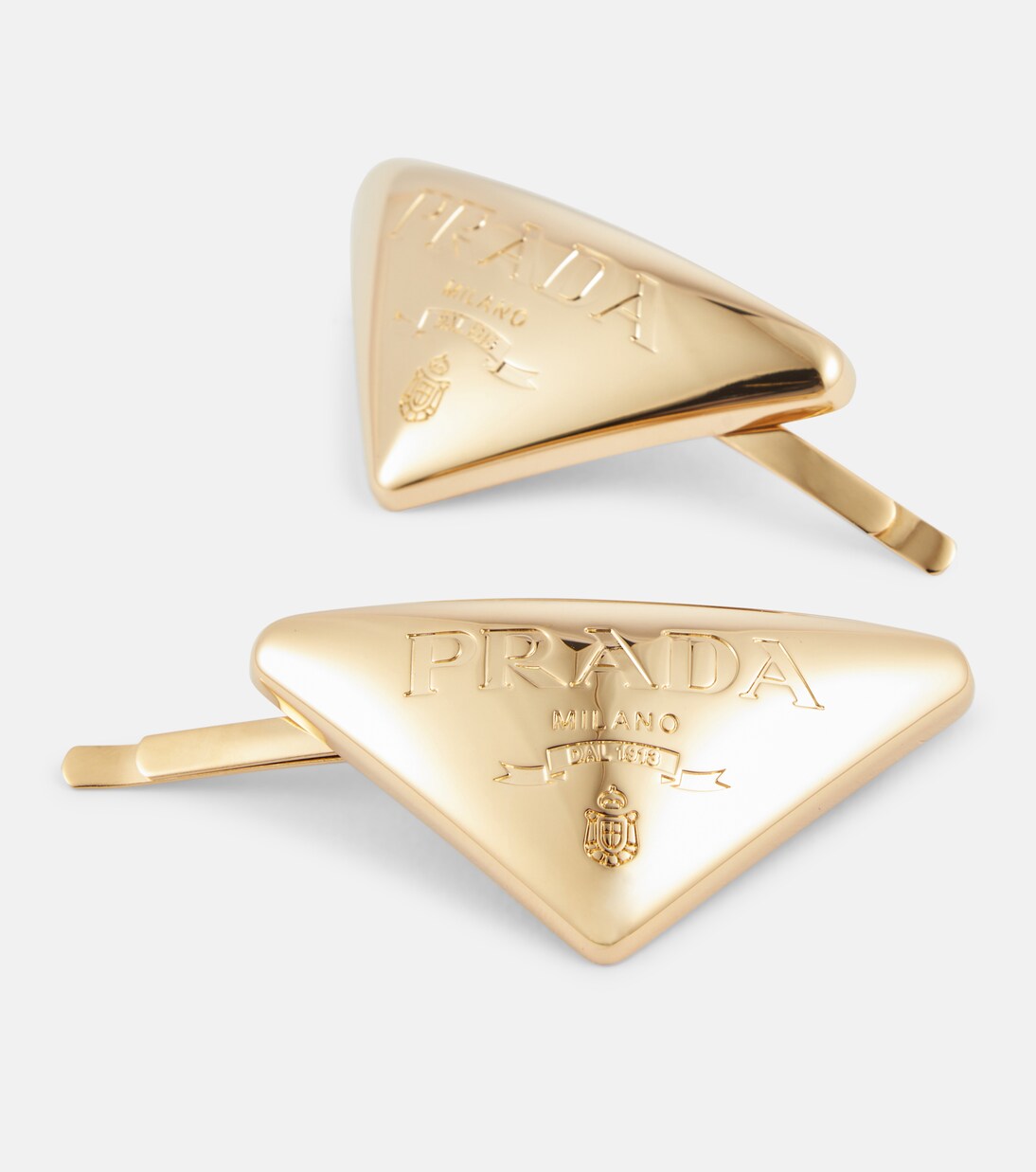 Fermacapelli glamour con logo PRADA, stile giovane e trendy
