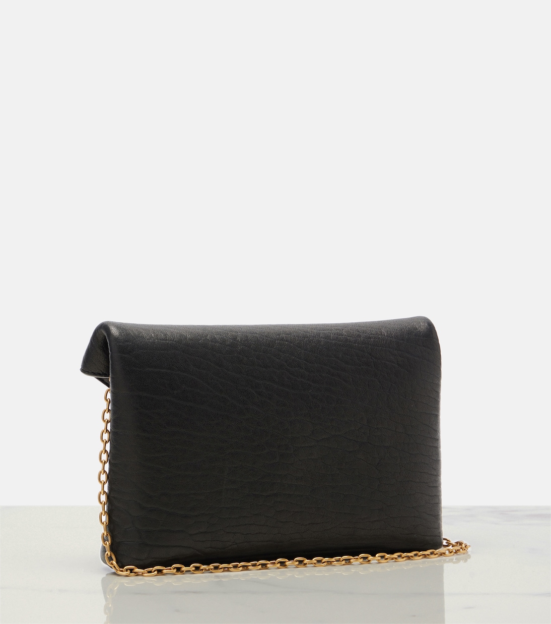 Cassandre Small leather clutch | Saint Laurent