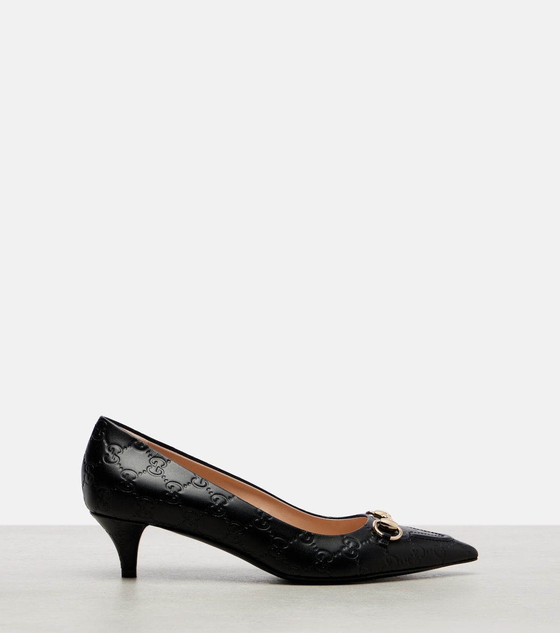 Erin 45 debossed leather pumps | Gucci