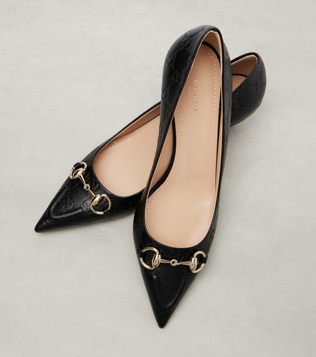 Erin 45 debossed leather pumps | Gucci