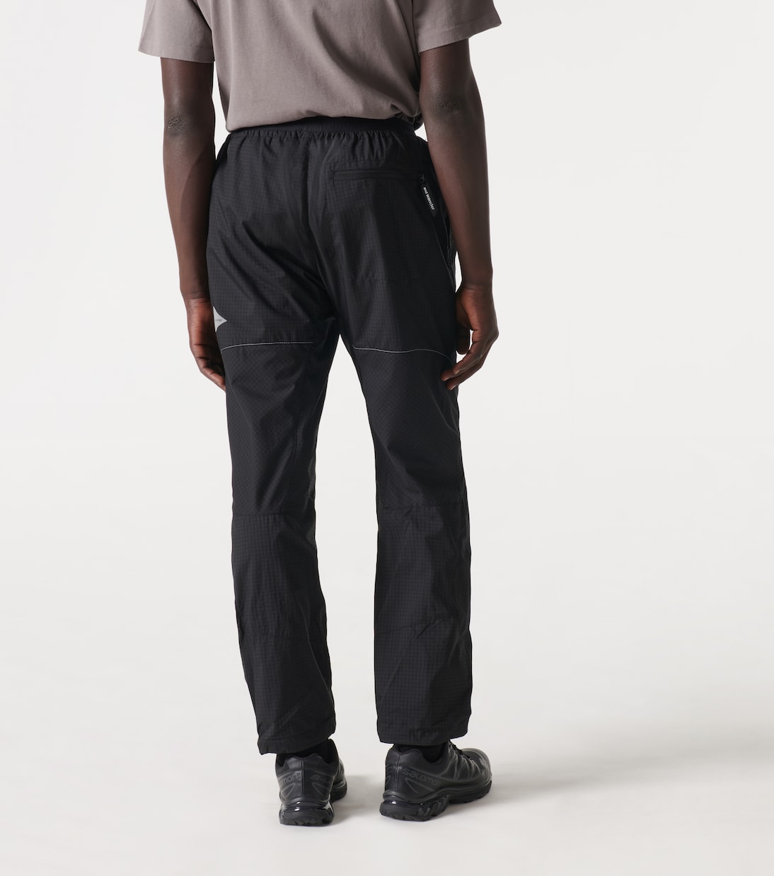 Pantalones rectos de nylon ripstop | And Wander