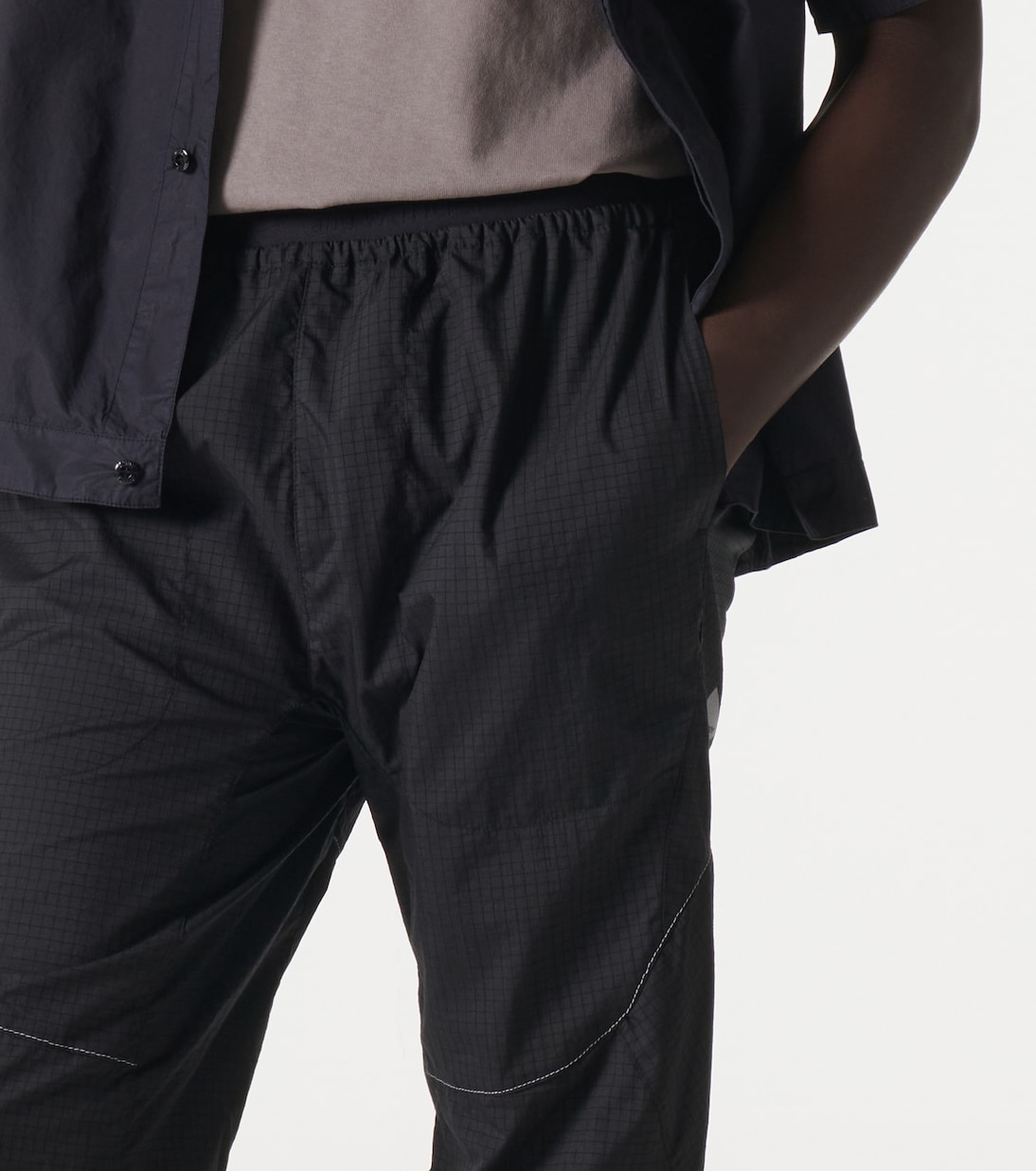 Pantalones rectos de nylon ripstop | And Wander