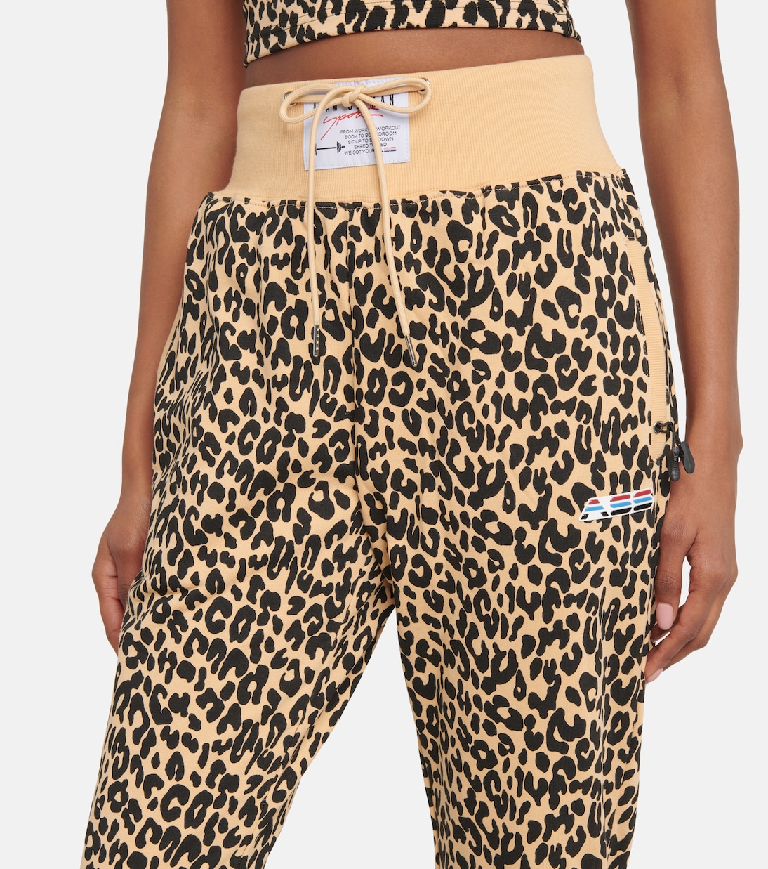 High rise leopard print sweatpants in beige Adam Selman Sport Mytheresa
