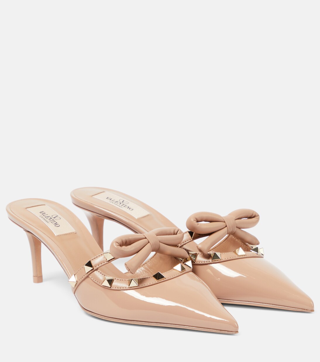 Rockstud bow detail patent leather mules in pink Valentino Garavani Mytheresa