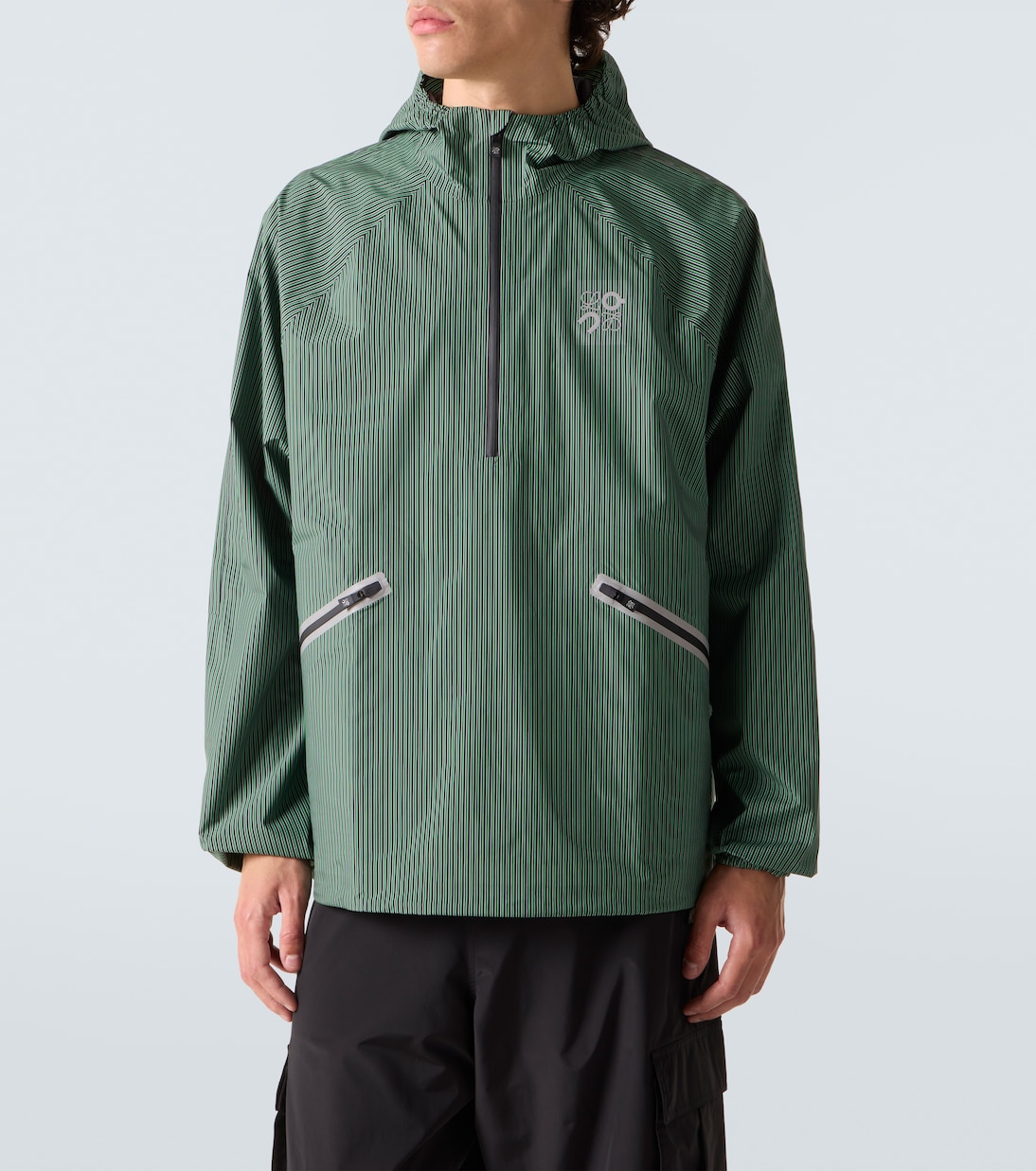 x On striped technical jacket  | Loewe