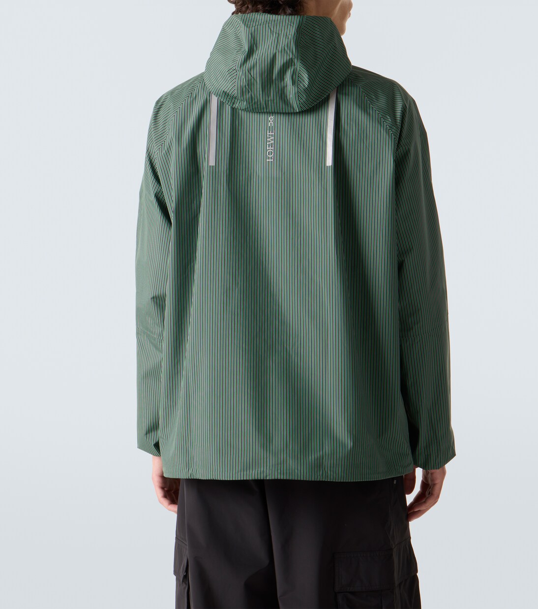 x On striped technical jacket  | Loewe