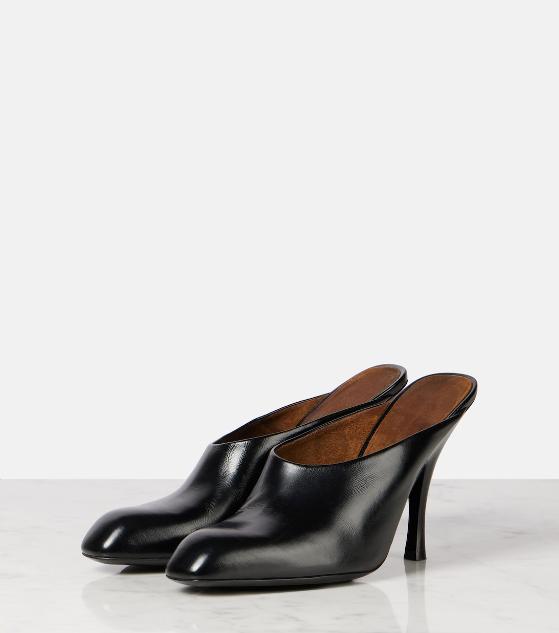Mules Colt 100 en cuir | Khaite