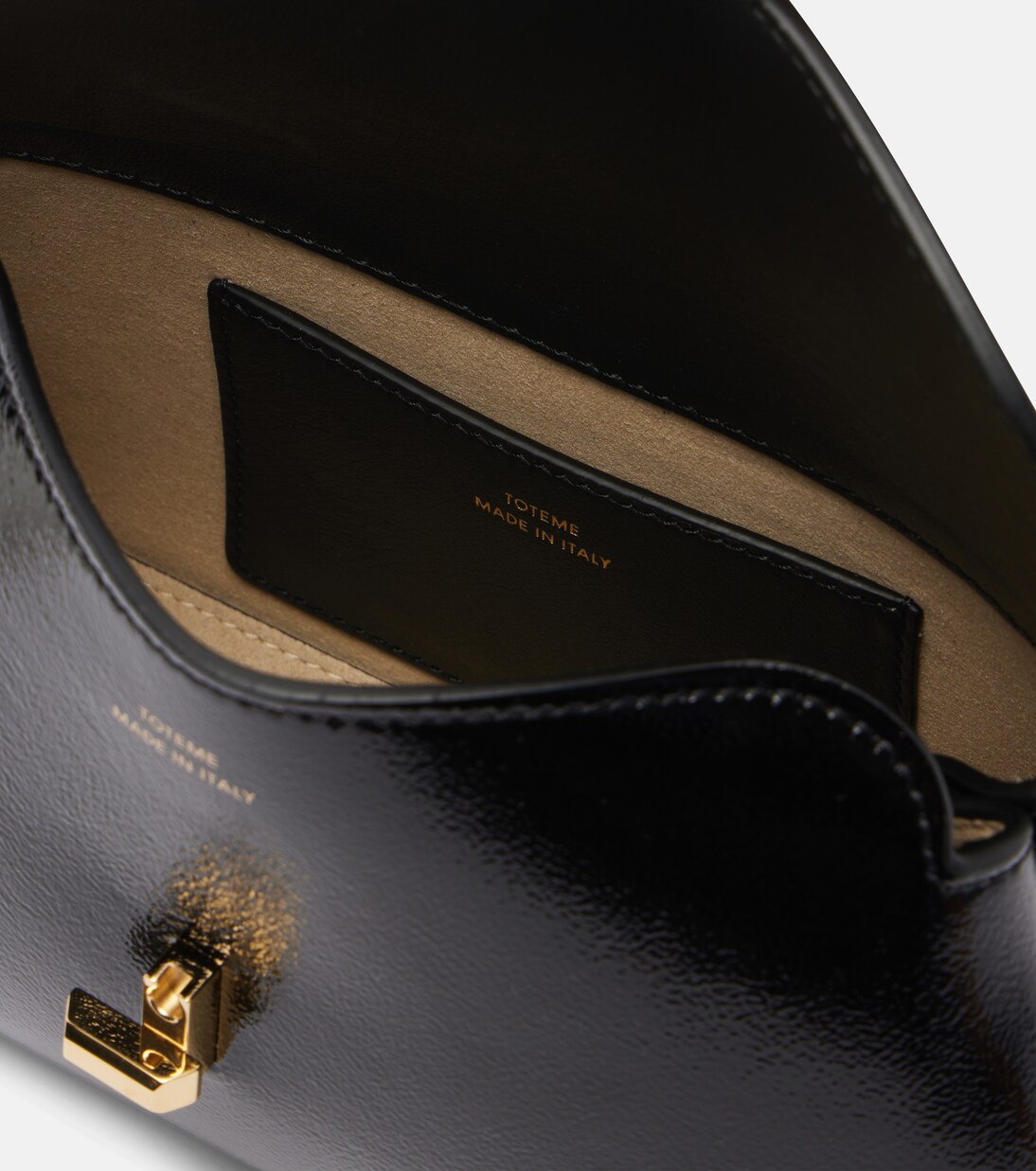 T-Lock Mini patent leather clutch | Toteme