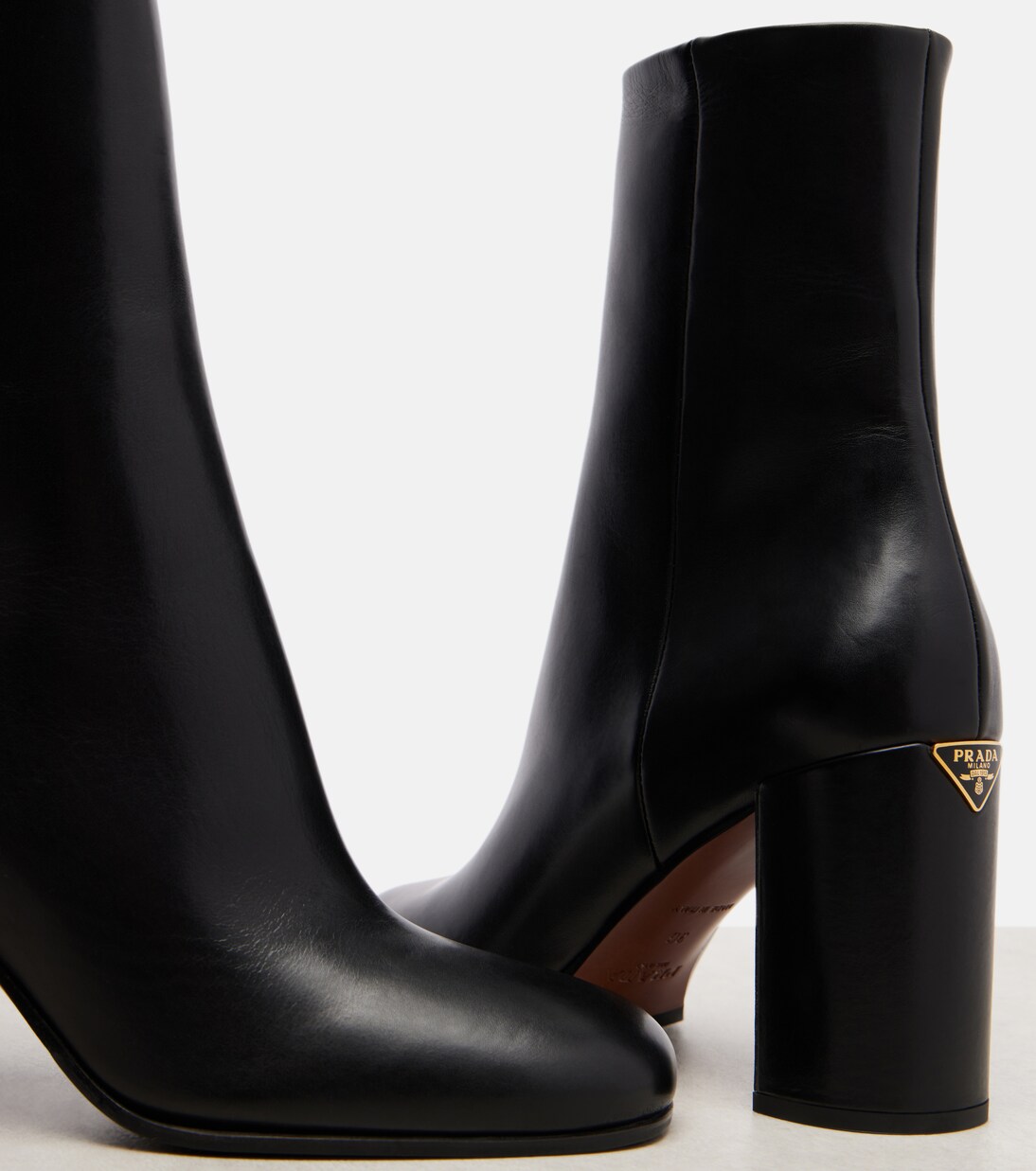 Logo leather ankle boots | Prada