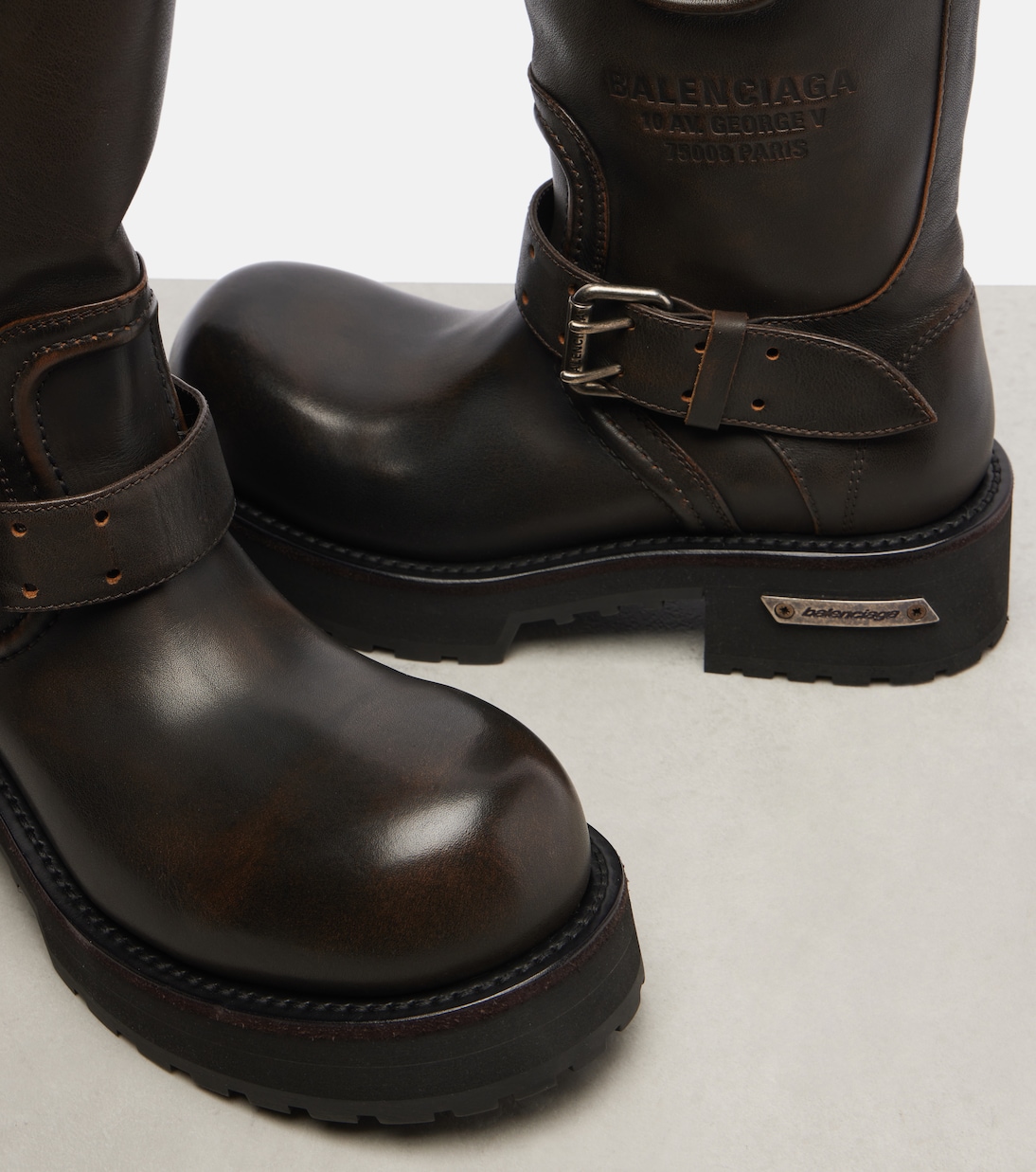 Venom debossed leather boots | Balenciaga