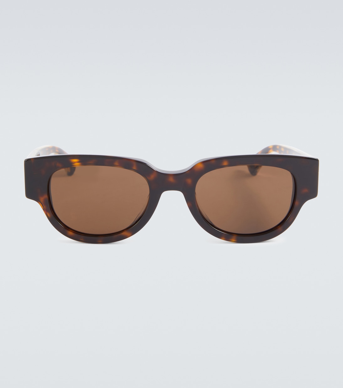 Tortoiseshell oval sunglasses | Bottega Veneta