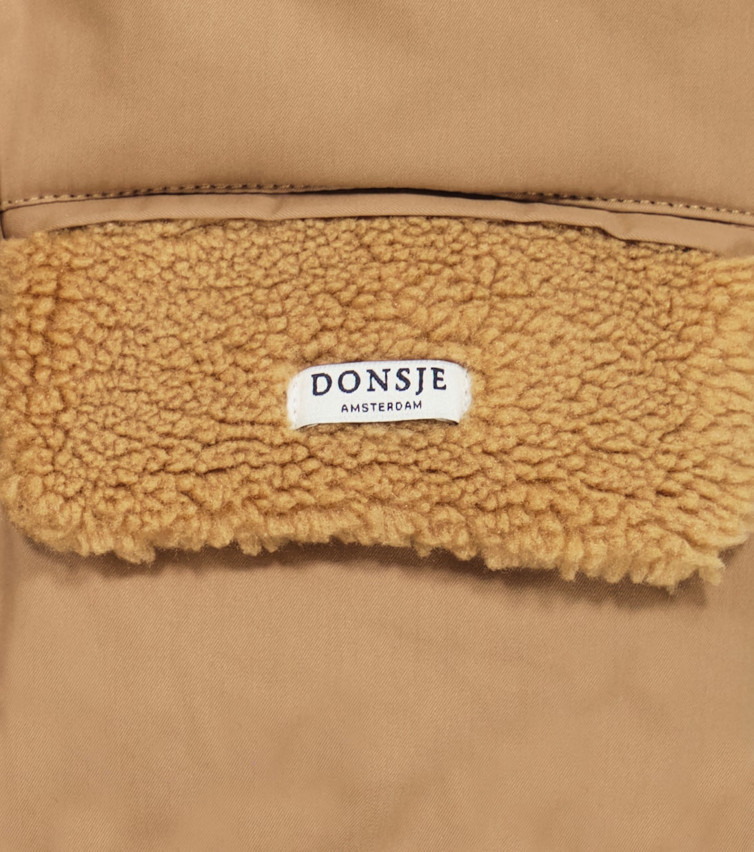 Wander shearling-trimmed puffer jacket | Donsje